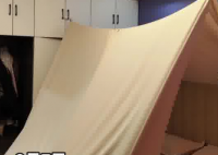 女子住酒店用一根绳子一块布防偷拍 究竟是怎么回事？